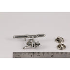 A handcrafted Spinning Rod Reel Pin next to a ruler, available for sale at Creativeartisan.com - the image offers a sense of scale