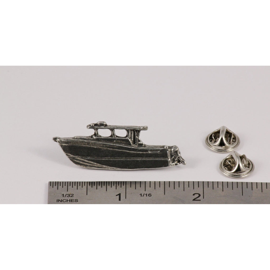 A handcrafted Power Boat Pin next to a ruler, available for sale at Creativeartisan.com - the image offers a sense of scale