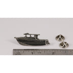 A handcrafted Power Boat Pin next to a ruler, available for sale at Creativeartisan.com - the image offers a sense of scale