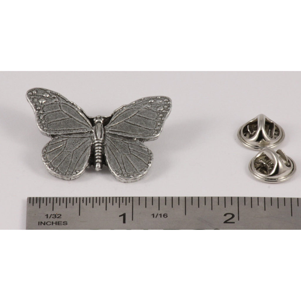 A handcrafted Monarch Butterfly Pin next to a ruler, available for sale at Creativeartisan.com - the image offers a sense of scale
