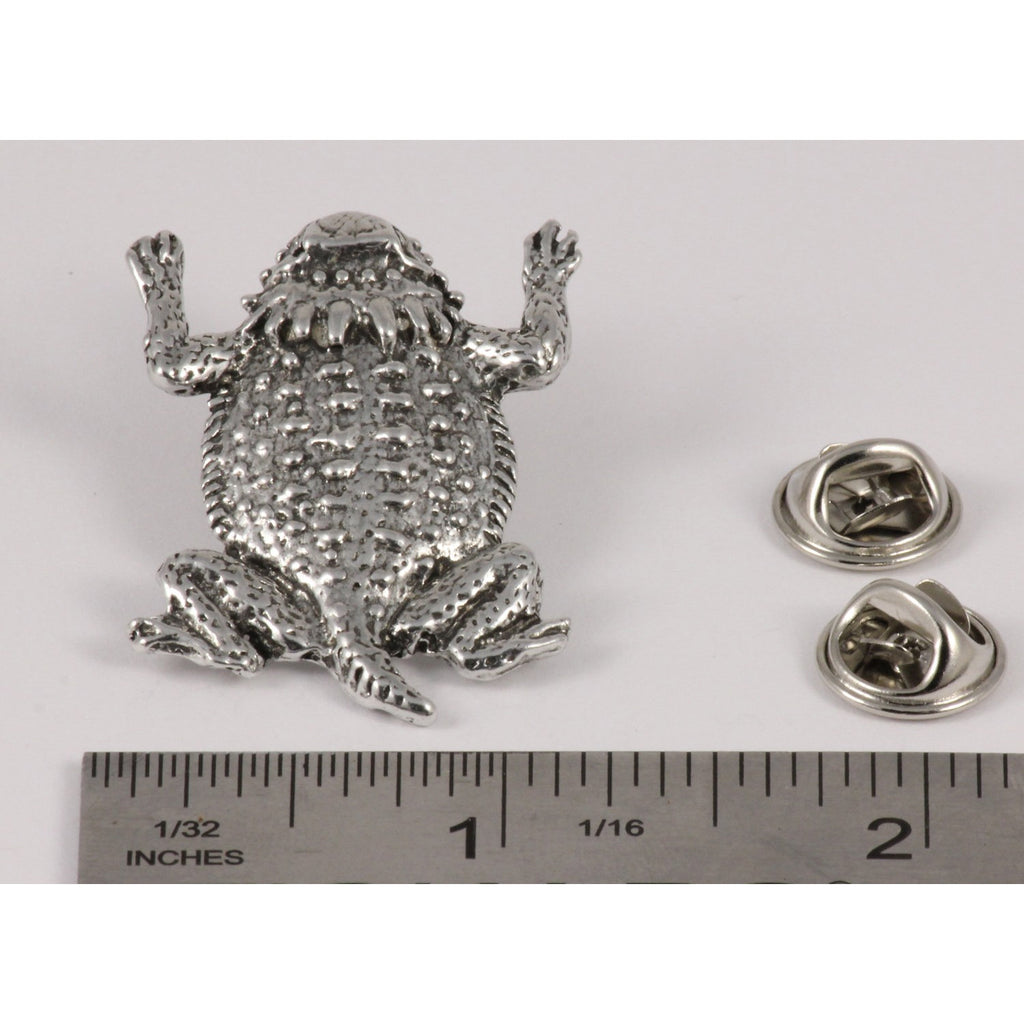 A handcrafted Horny Toad Short Horned Lizard Pin next to a ruler, available for sale at Creativeartisan.com - the image offers a sense of scale