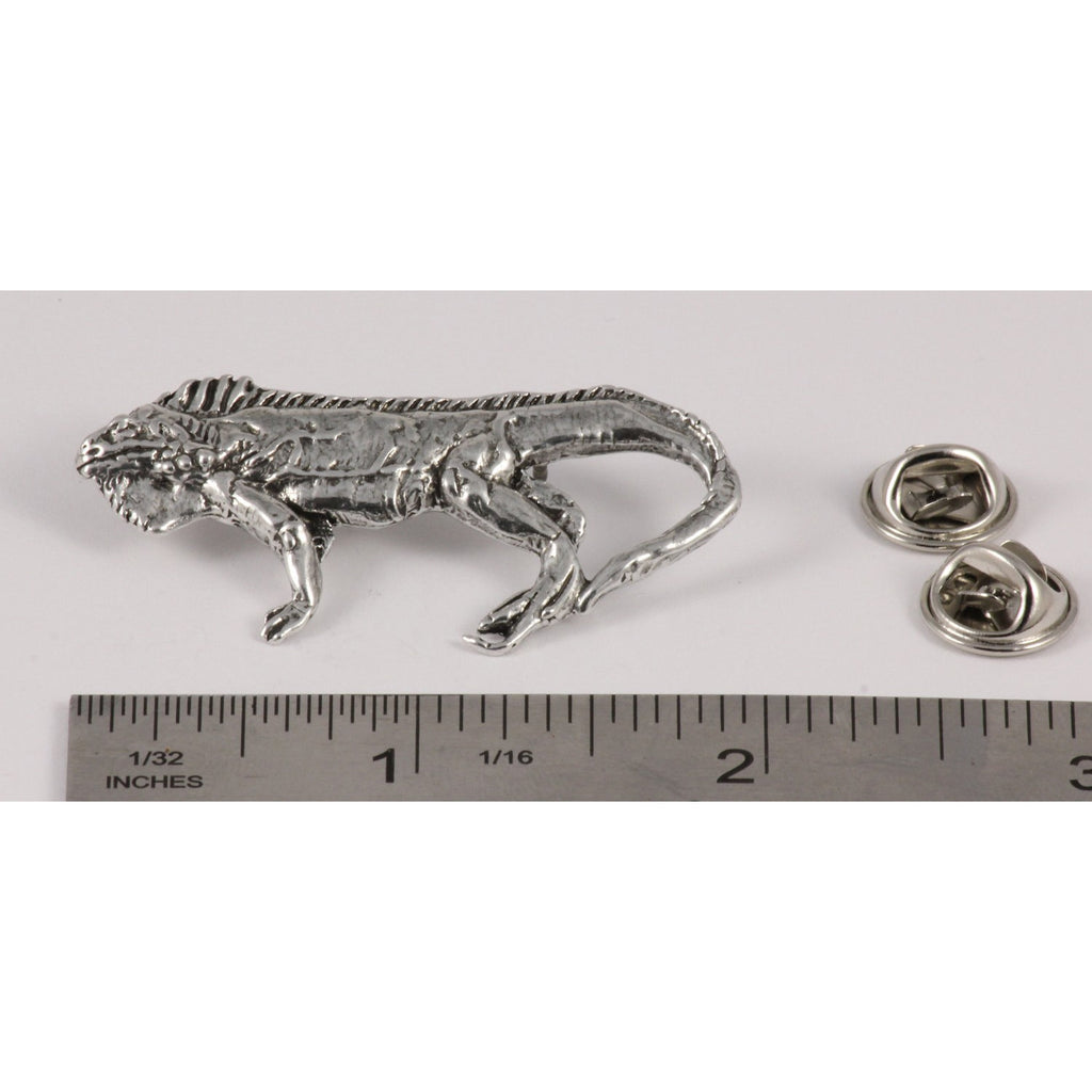 A handcrafted Iguana Pin next to a ruler, available for sale at Creativeartisan.com - the image offers a sense of scale