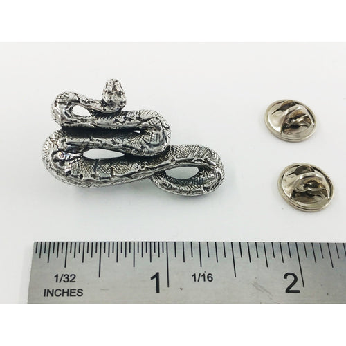 A handcrafted Boa Constrictor Pin next to a ruler, available for sale at Creativeartisan.com - the image offers a sense of scale