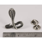 A handcrafted Cobra Pin next to a ruler, available for sale at Creativeartisan.com - the image offers a sense of scale
