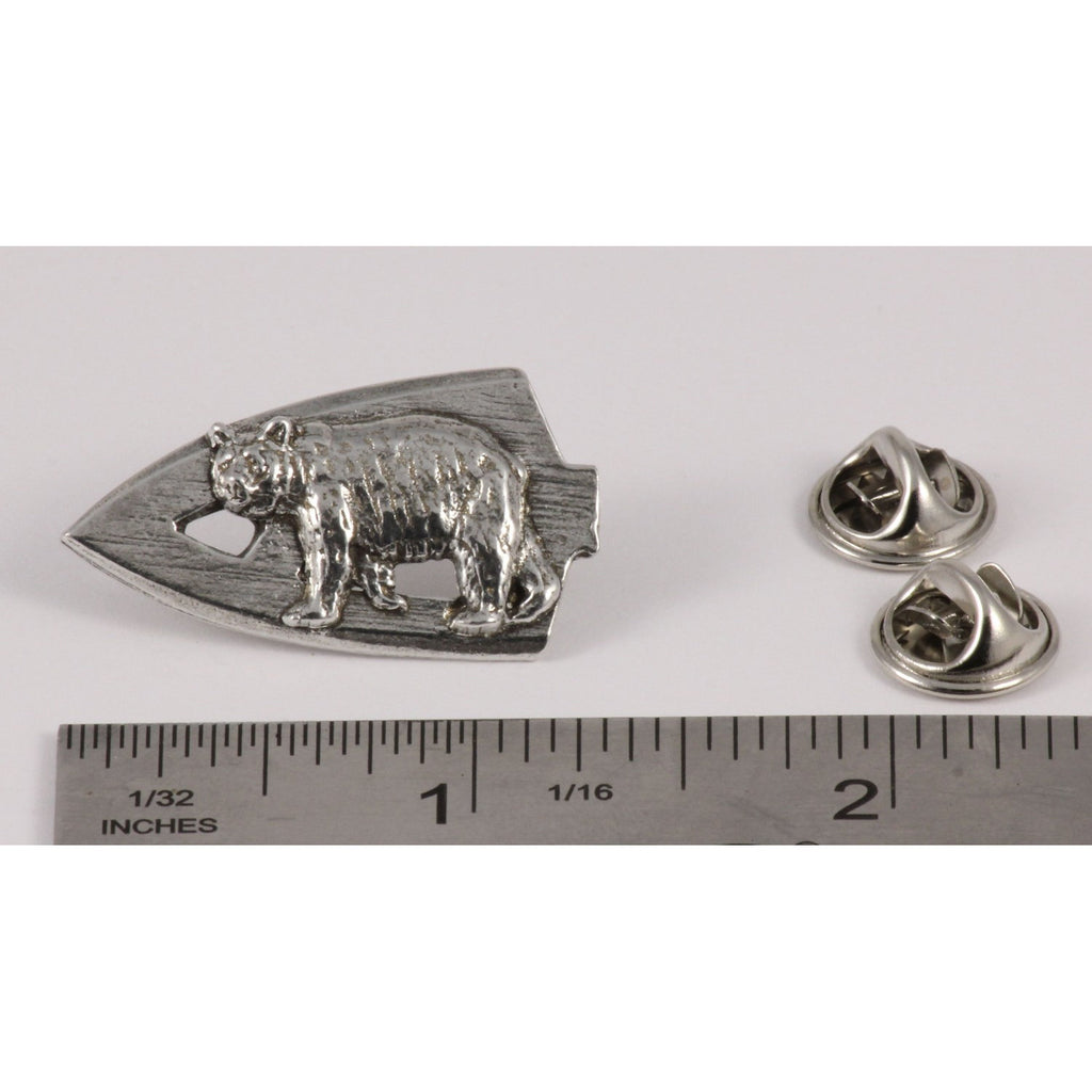 A handcrafted Broadhead With Black Bear Pin next to a ruler, available for sale at Creativeartisan.com - the image offers a sense of scale