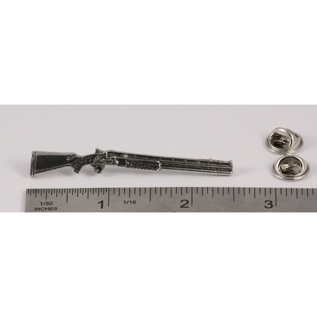A handcrafted Over Under Shotgun Pin next to a ruler, available for sale at Creativeartisan.com - the image offers a sense of scale
