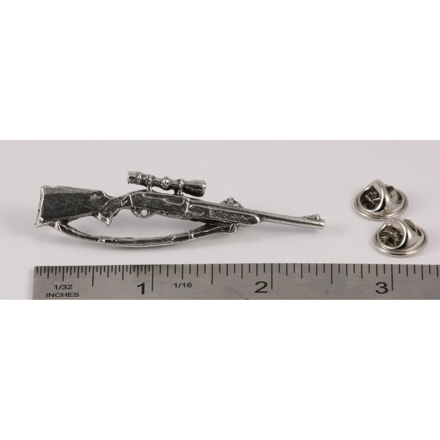 A handcrafted Bolt Action Rifle With Scope Pin next to a ruler, available for sale at Creativeartisan.com - the image offers a sense of scale