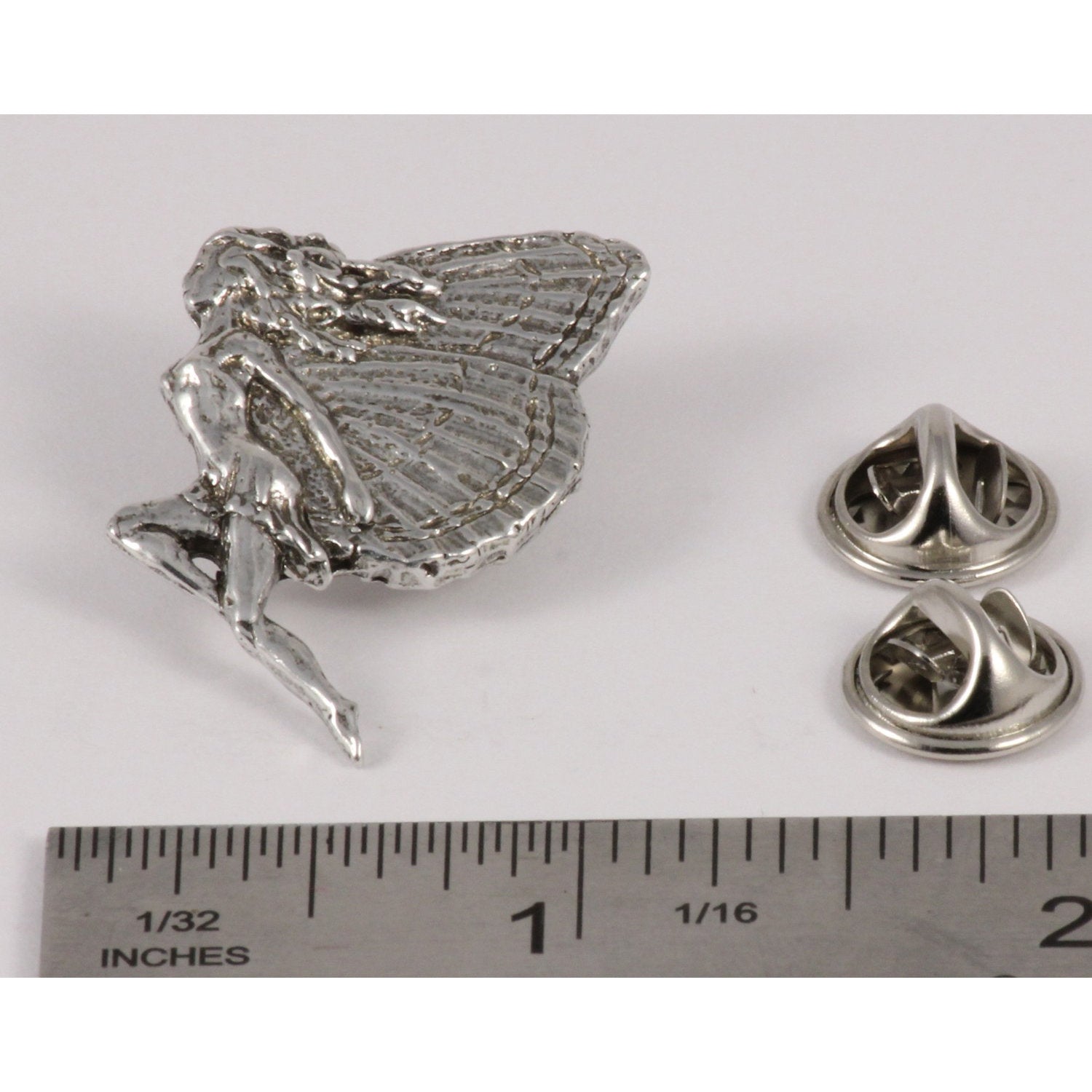 A handcrafted Fairy Pin next to a ruler, available for sale at Creativeartisan.com - the image offers a sense of scale