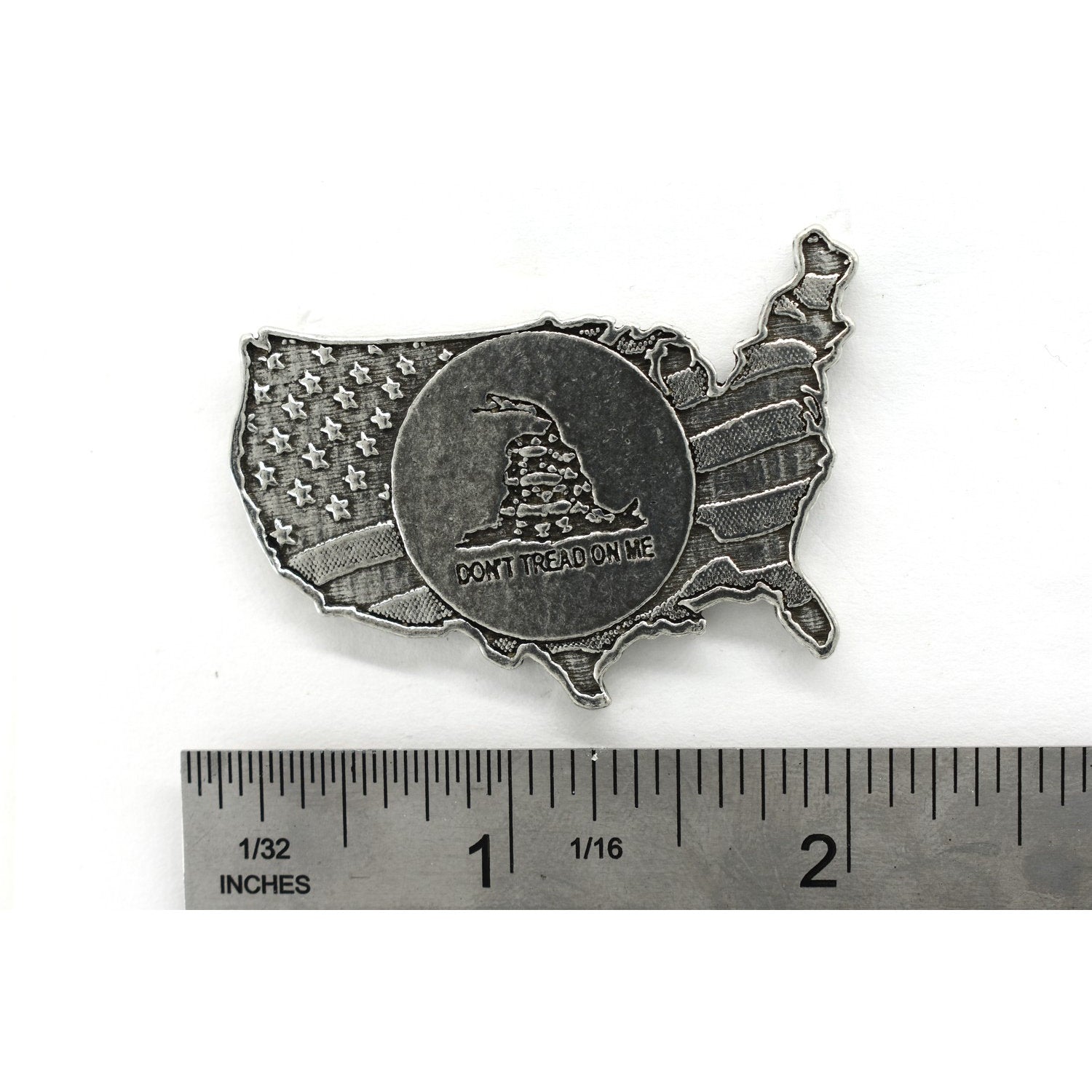 A handcrafted American Flag Dont Tread On Me Pin next to a ruler, available for sale at Creativeartisan.com - the image offers a sense of scale