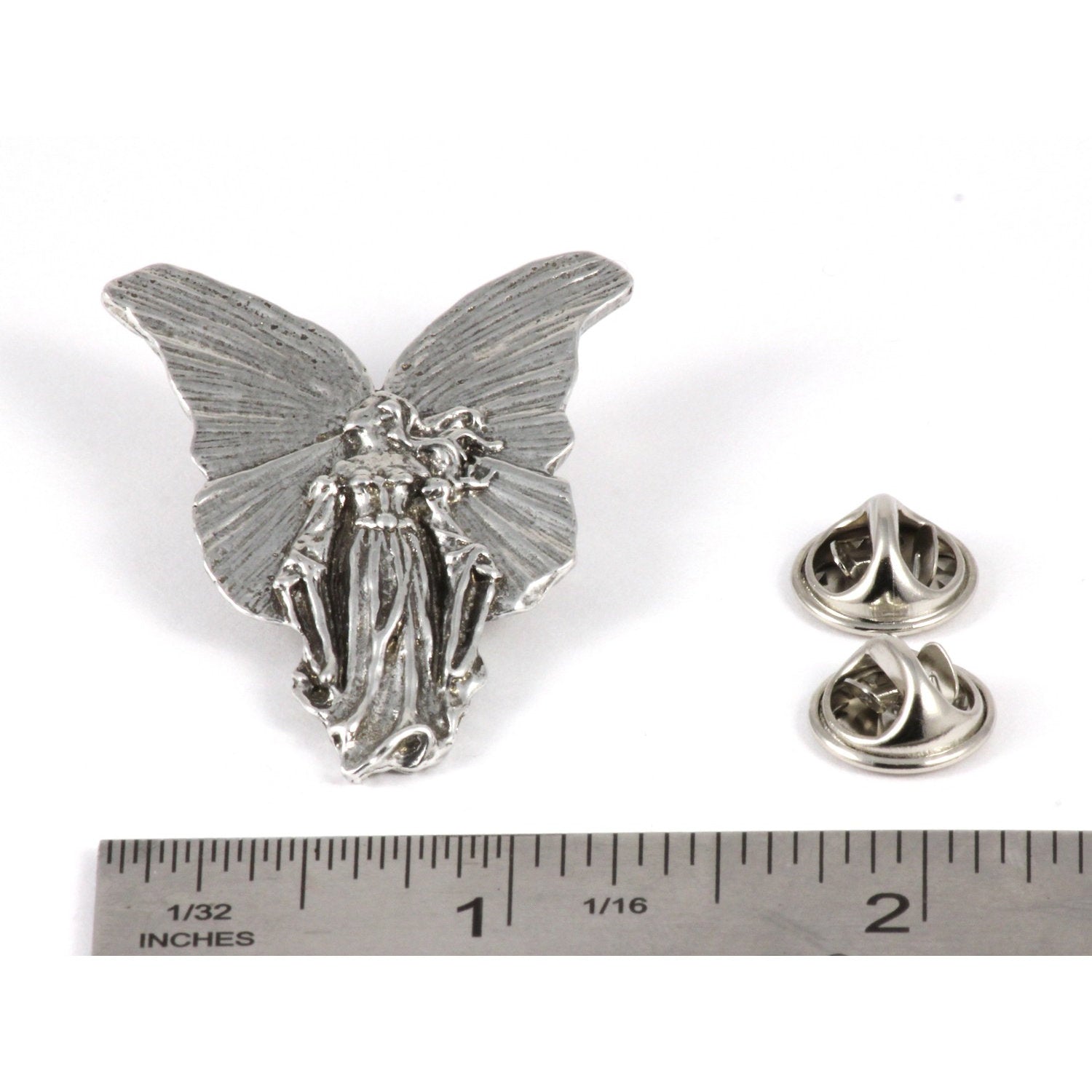 A handcrafted Angel Pin next to a ruler, available for sale at Creativeartisan.com - the image offers a sense of scale