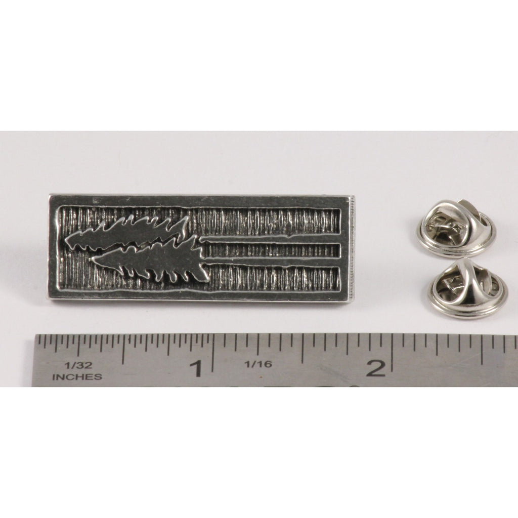 A handcrafted Tall Trees Pin next to a ruler, available for sale at Creativeartisan.com - the image offers a sense of scale