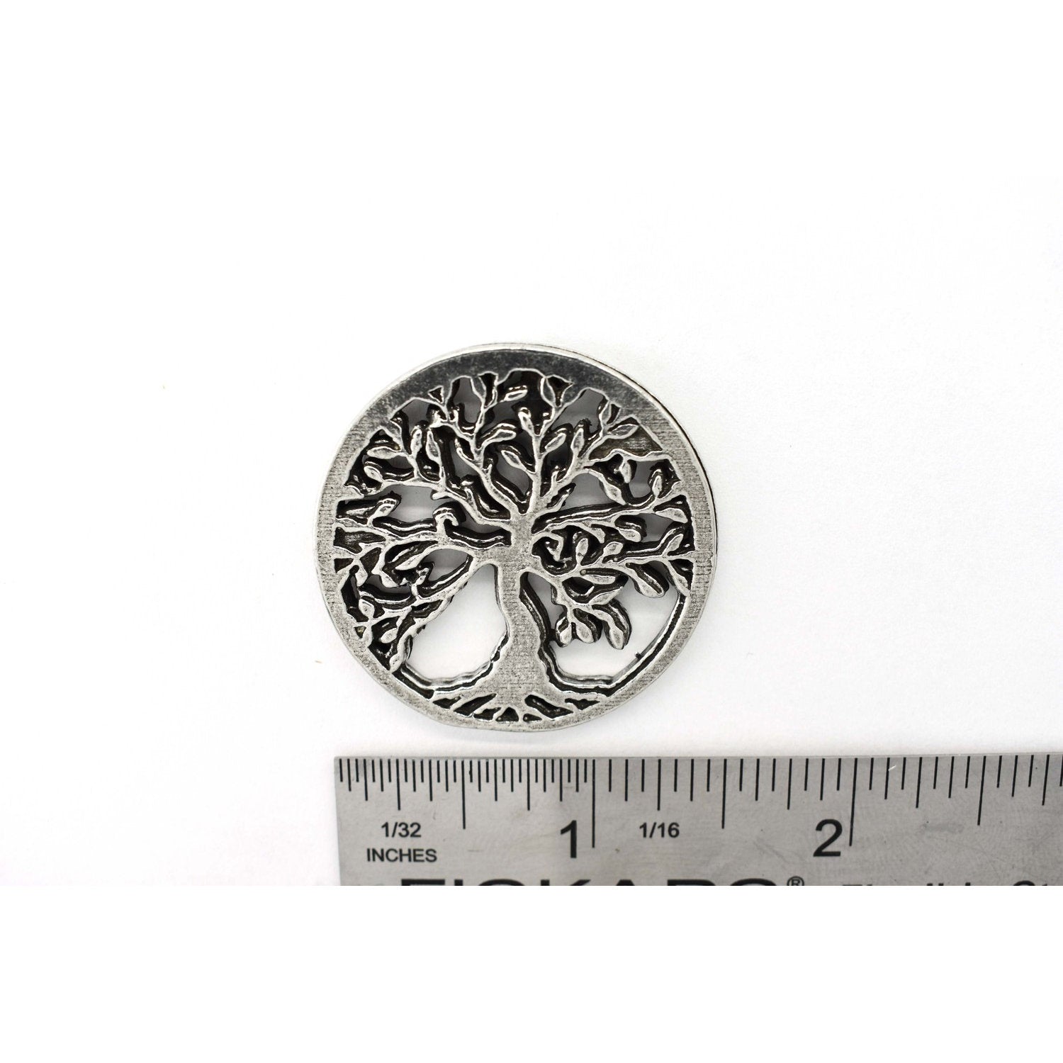 A handcrafted Tree Of Life Pin next to a ruler, available for sale at Creativeartisan.com - the image offers a sense of scale