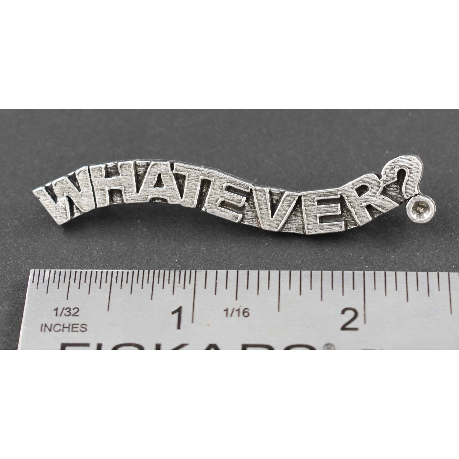 A handcrafted Whatever Pin next to a ruler, available for sale at Creativeartisan.com - the image offers a sense of scale