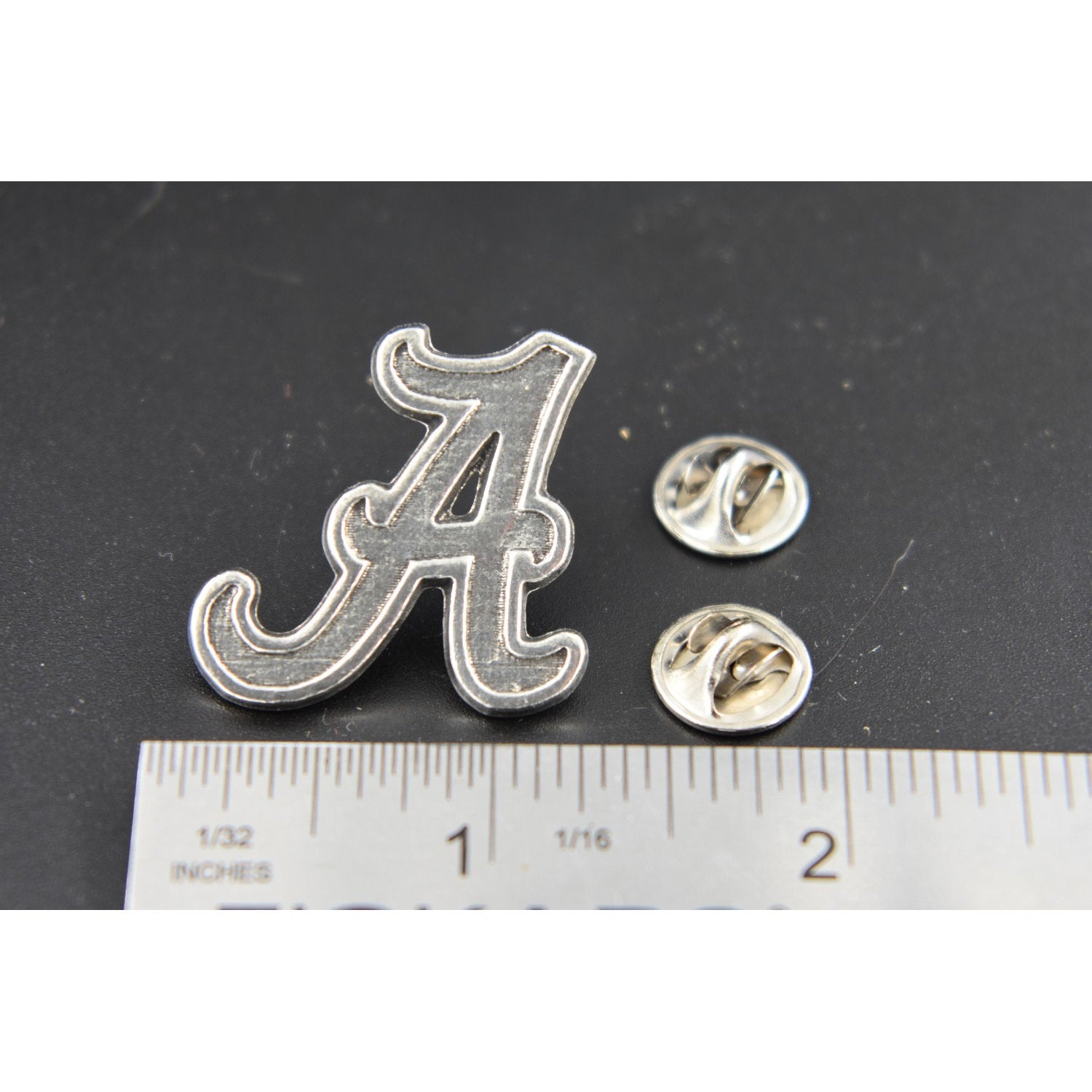 A handcrafted Fancy A Pin next to a ruler, available for sale at Creativeartisan.com - the image offers a sense of scale