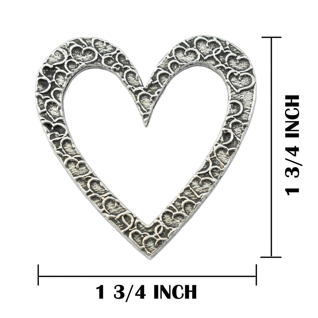 A handcrafted Big Heart Pin next to a ruler, available for sale at Creativeartisan.com - the image offers a sense of scale