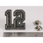 A handcrafted 12 Pin next to a ruler, available for sale at Creativeartisan.com - the image offers a sense of scale