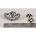 A handcrafted Double Heart Pin next to a ruler, available for sale at Creativeartisan.com - the image offers a sense of scale