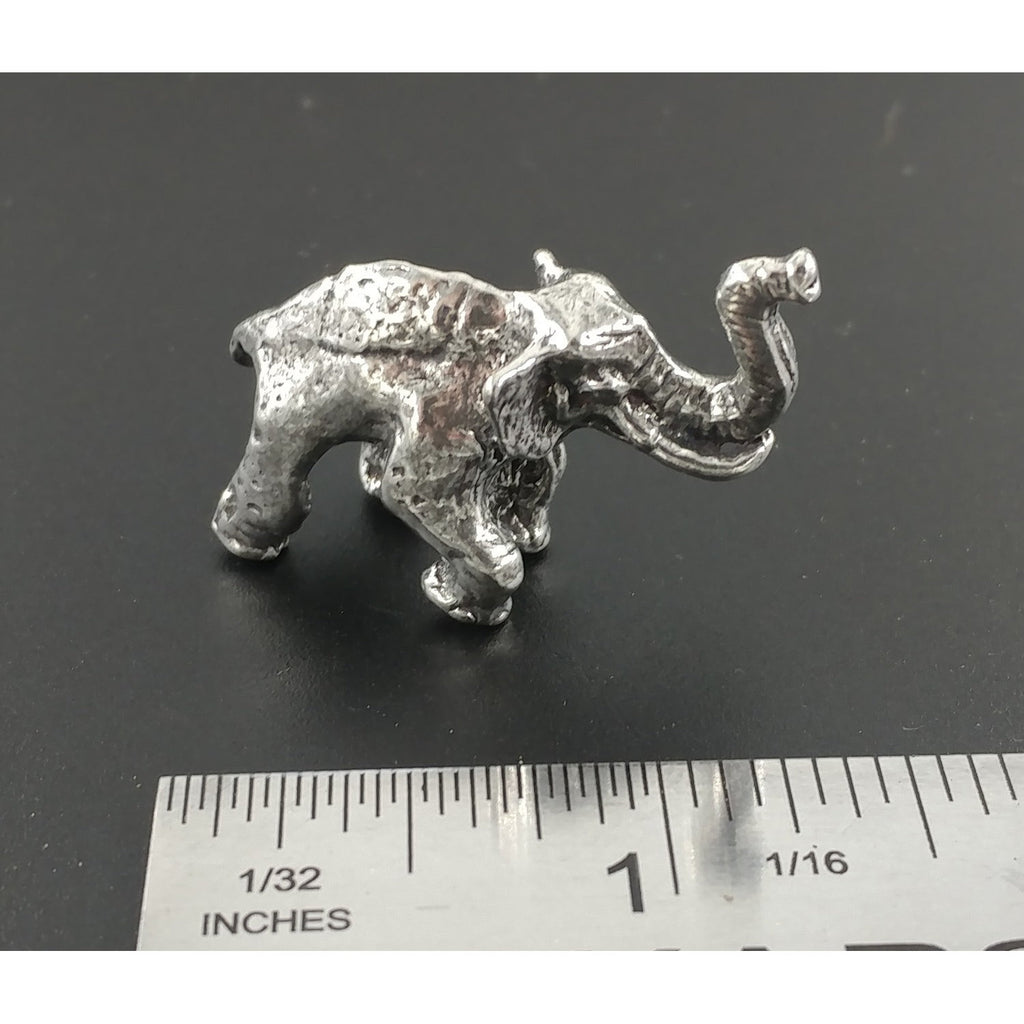 A handcrafted Elephant 3D Pin next to a ruler, available for sale at Creativeartisan.com - the image offers a sense of scale