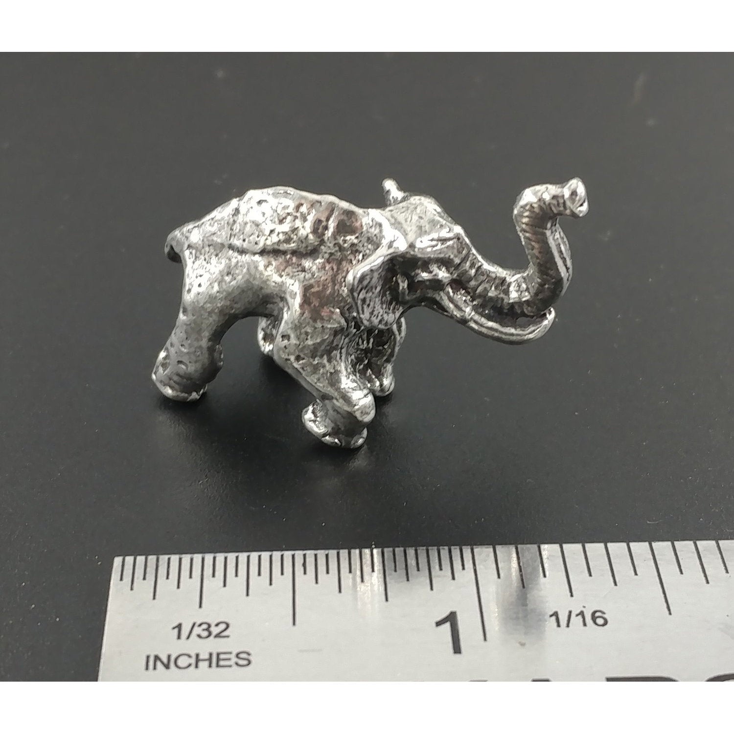 A handcrafted Elephant 3D Pin next to a ruler, available for sale at Creativeartisan.com - the image offers a sense of scale