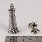 A handcrafted Lighthouse Pin next to a ruler, available for sale at Creativeartisan.com - the image offers a sense of scale