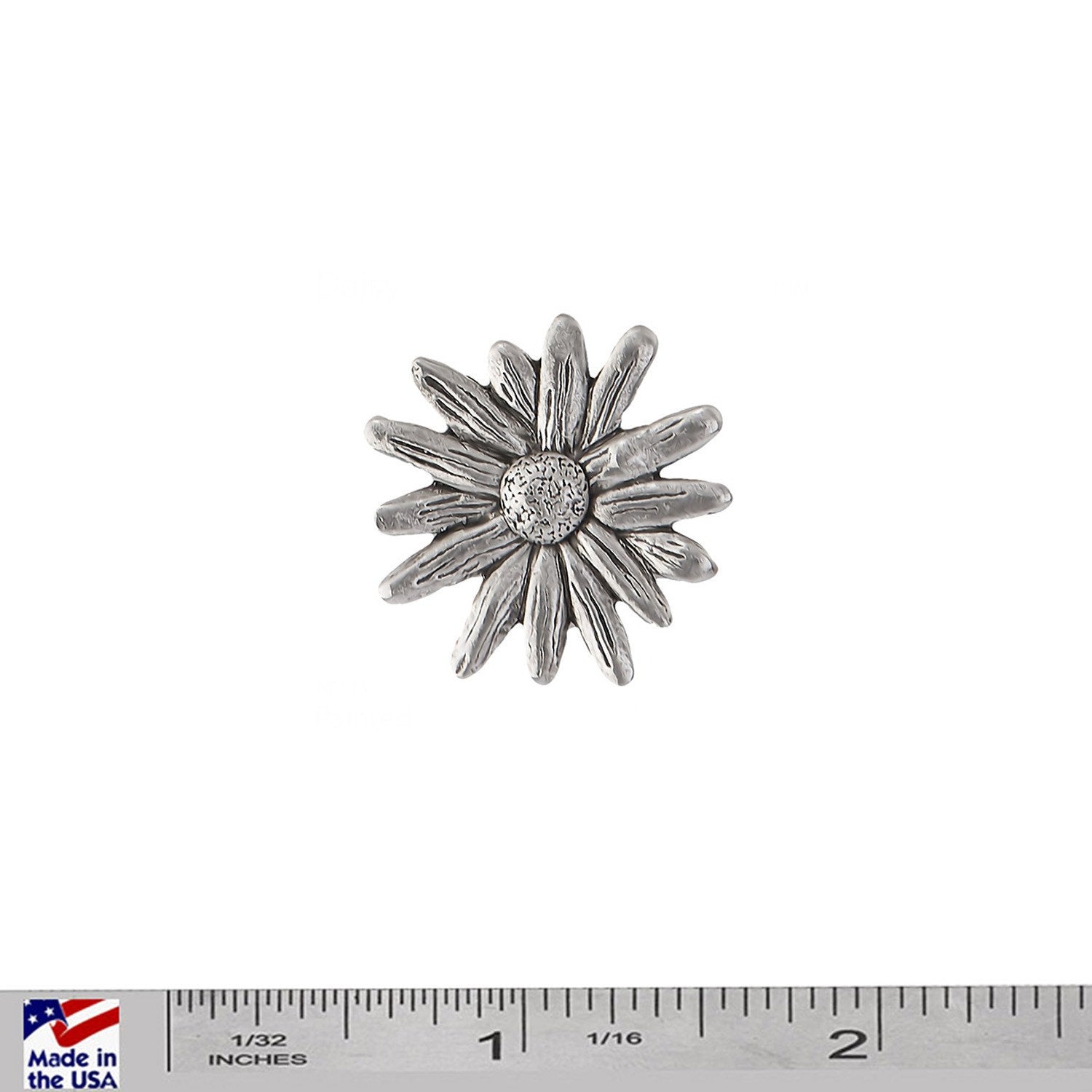 A handcrafted Daisy Pin next to a ruler, available for sale at Creativeartisan.com - the image offers a sense of scale