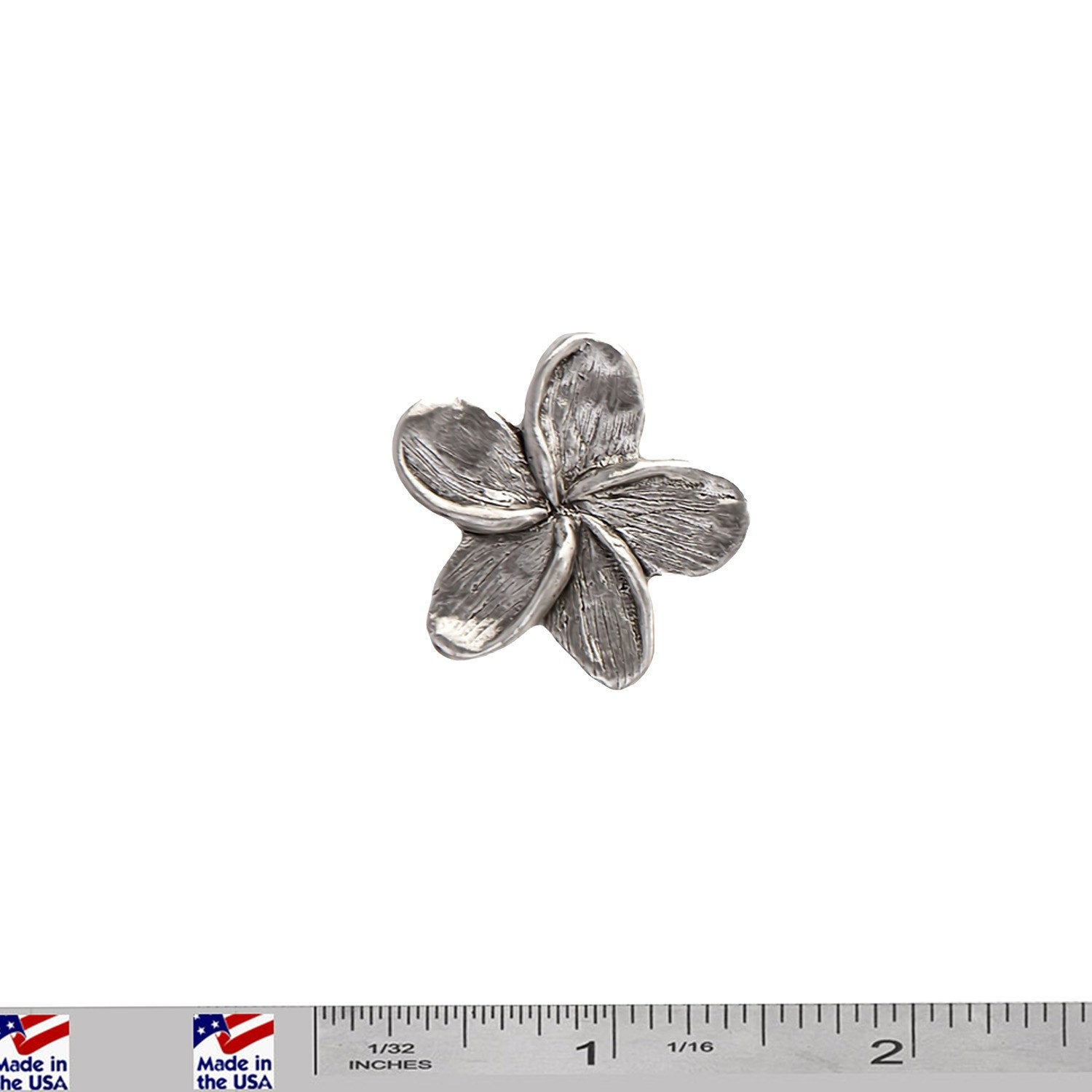 A handcrafted Frangipani Flower Pin next to a ruler, available for sale at Creativeartisan.com - the image offers a sense of scale