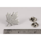 A handcrafted Canadian Maple Leaf Pin next to a ruler, available for sale at Creativeartisan.com - the image offers a sense of scale