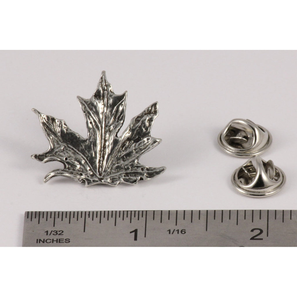 A handcrafted Maple Leaf Pin next to a ruler, available for sale at Creativeartisan.com - the image offers a sense of scale