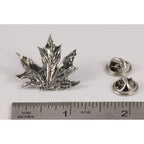 A handcrafted Maple Leaf Pin next to a ruler, available for sale at Creativeartisan.com - the image offers a sense of scale