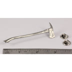 A handcrafted Firemans Axe Pin next to a ruler, available for sale at Creativeartisan.com - the image offers a sense of scale