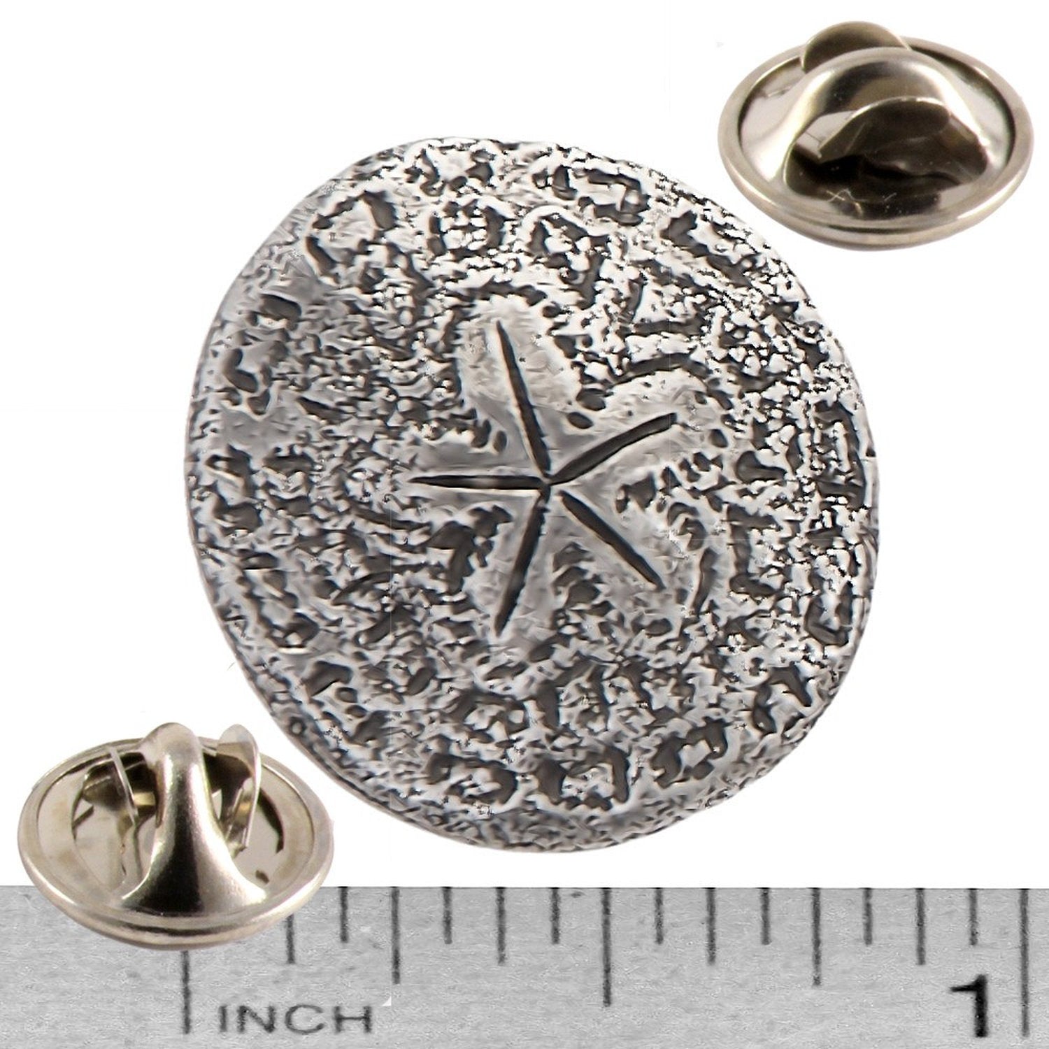 A handcrafted Sand Dollar Pin next to a ruler, available for sale at Creativeartisan.com - the image offers a sense of scale