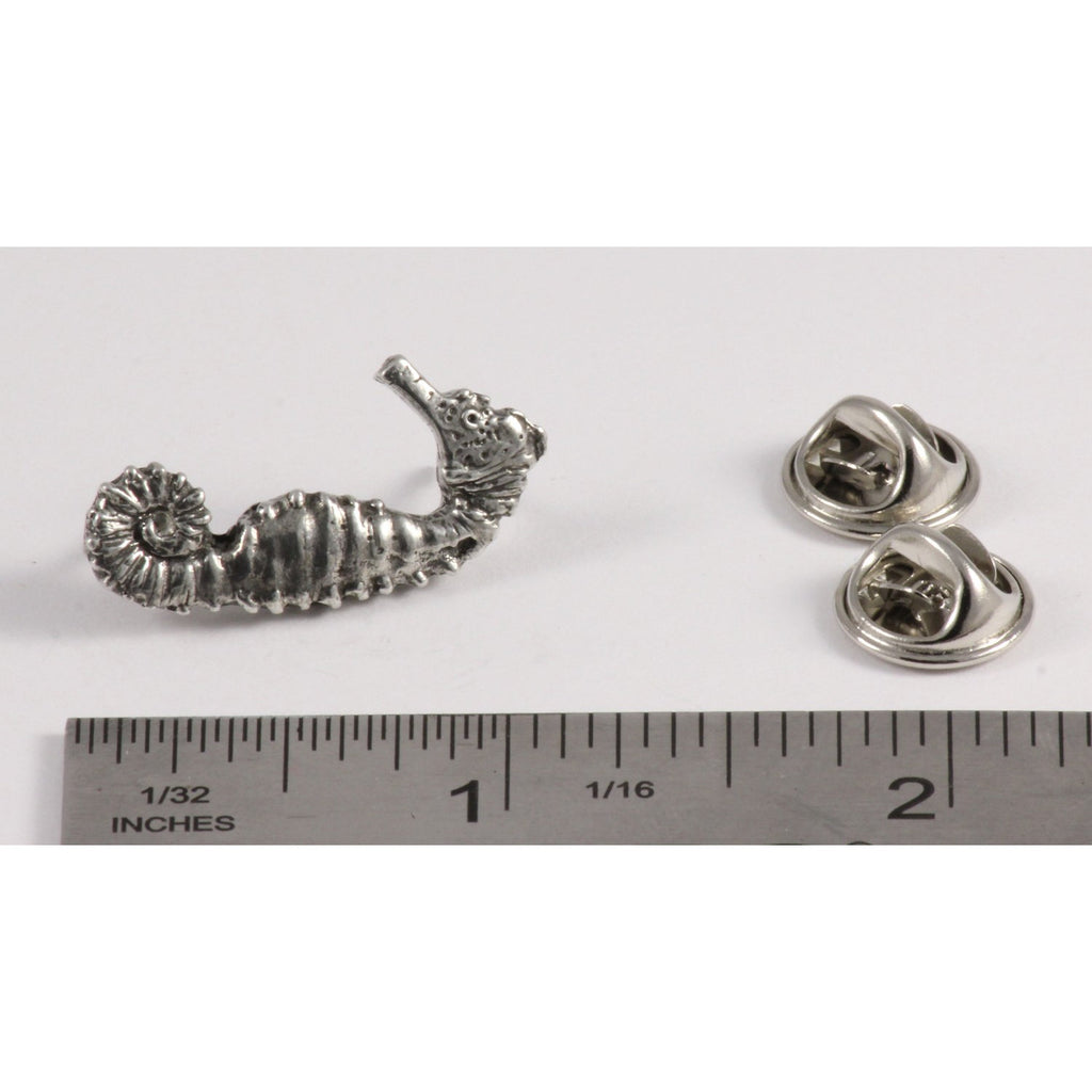 A handcrafted Seahorse Pin next to a ruler, available for sale at Creativeartisan.com - the image offers a sense of scale