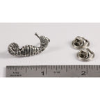 A handcrafted Seahorse Pin next to a ruler, available for sale at Creativeartisan.com - the image offers a sense of scale
