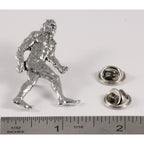 A handcrafted Sasquatch Bigfoot Full Body Pin next to a ruler, available for sale at Creativeartisan.com - the image offers a sense of scale