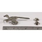 A handcrafted Feathered Velociraptor Pin next to a ruler, available for sale at Creativeartisan.com - the image offers a sense of scale