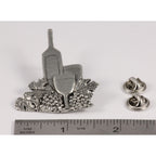 A handcrafted White Wine Bottle Glass Pin next to a ruler, available for sale at Creativeartisan.com - the image offers a sense of scale