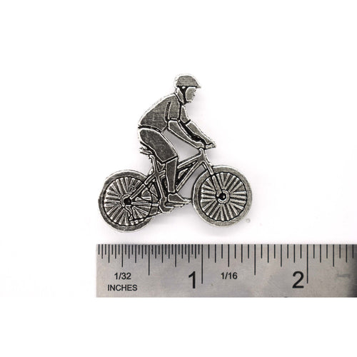 A handcrafted Bicycler Pin next to a ruler, available for sale at Creativeartisan.com - the image offers a sense of scale