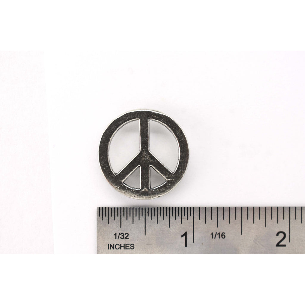 A handcrafted Peace Sign Plain Pin next to a ruler, available for sale at Creativeartisan.com - the image offers a sense of scale