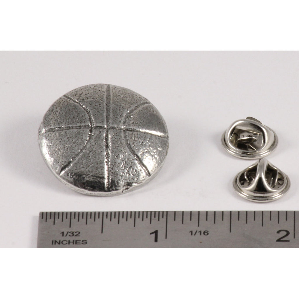 A handcrafted Basketball Pin next to a ruler, available for sale at Creativeartisan.com - the image offers a sense of scale