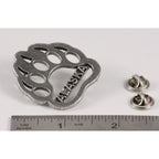 A handcrafted Bear Print Alaska Pin next to a ruler, available for sale at Creativeartisan.com - the image offers a sense of scale