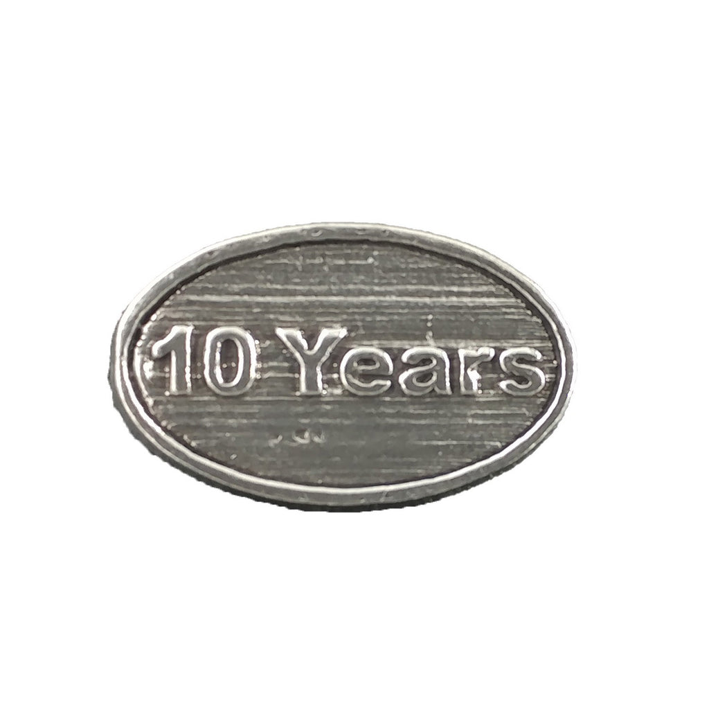 Detailed Antique Pewter 10 Year Pin that can be worn on a hat, jacket, backpack, etc.