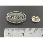 A handcrafted 15 Year Pin next to a ruler, available for sale at Creativeartisan.com - the image offers a sense of scale