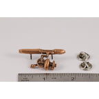 A handcrafted Spinning Rod Reel Pin next to a ruler, available for sale at Creativeartisan.com - the image offers a sense of scale