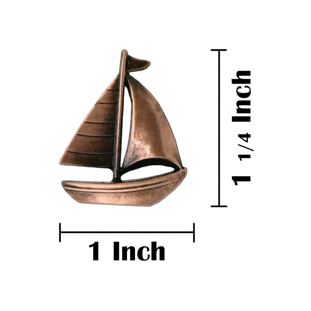 A handcrafted Sailboat Pin next to a ruler, available for sale at Creativeartisan.com - the image offers a sense of scale