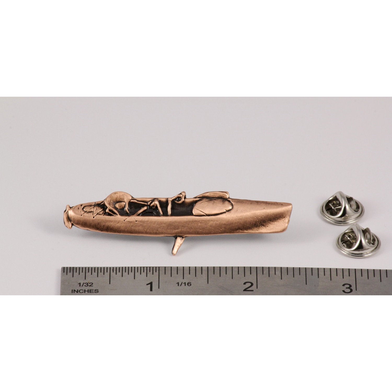 A handcrafted Hobie Fishing Kayak Pin next to a ruler, available for sale at Creativeartisan.com - the image offers a sense of scale