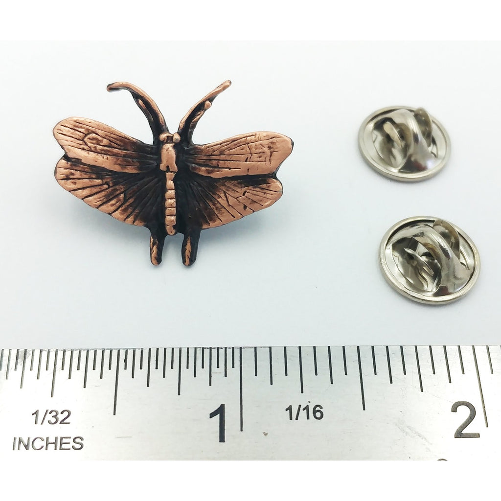 A handcrafted Moth Pin next to a ruler, available for sale at Creativeartisan.com - the image offers a sense of scale