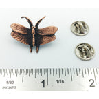 A handcrafted Moth Pin next to a ruler, available for sale at Creativeartisan.com - the image offers a sense of scale