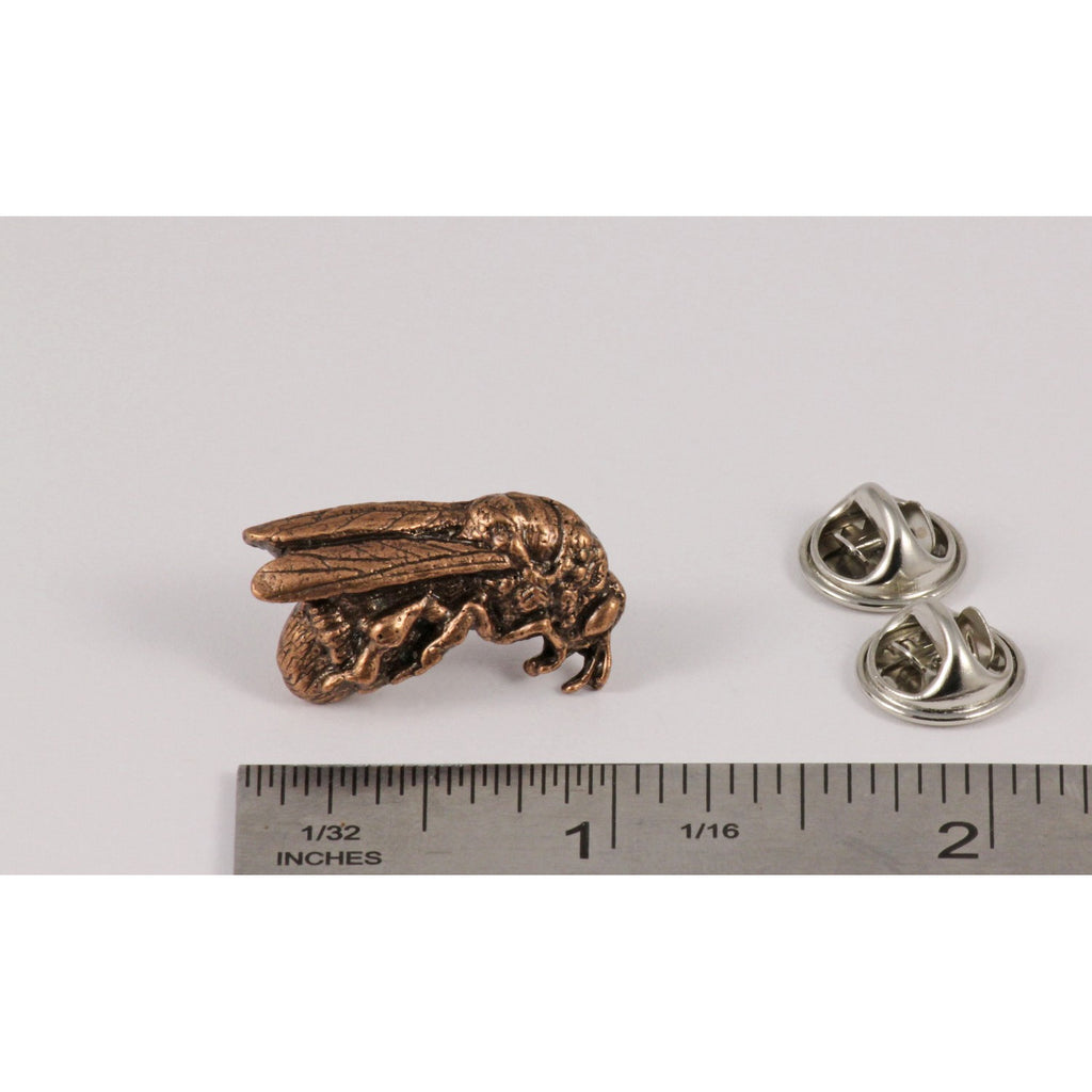 A handcrafted Honey Bee Pin next to a ruler, available for sale at Creativeartisan.com - the image offers a sense of scale