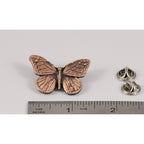 A handcrafted Monarch Butterfly Pin next to a ruler, available for sale at Creativeartisan.com - the image offers a sense of scale