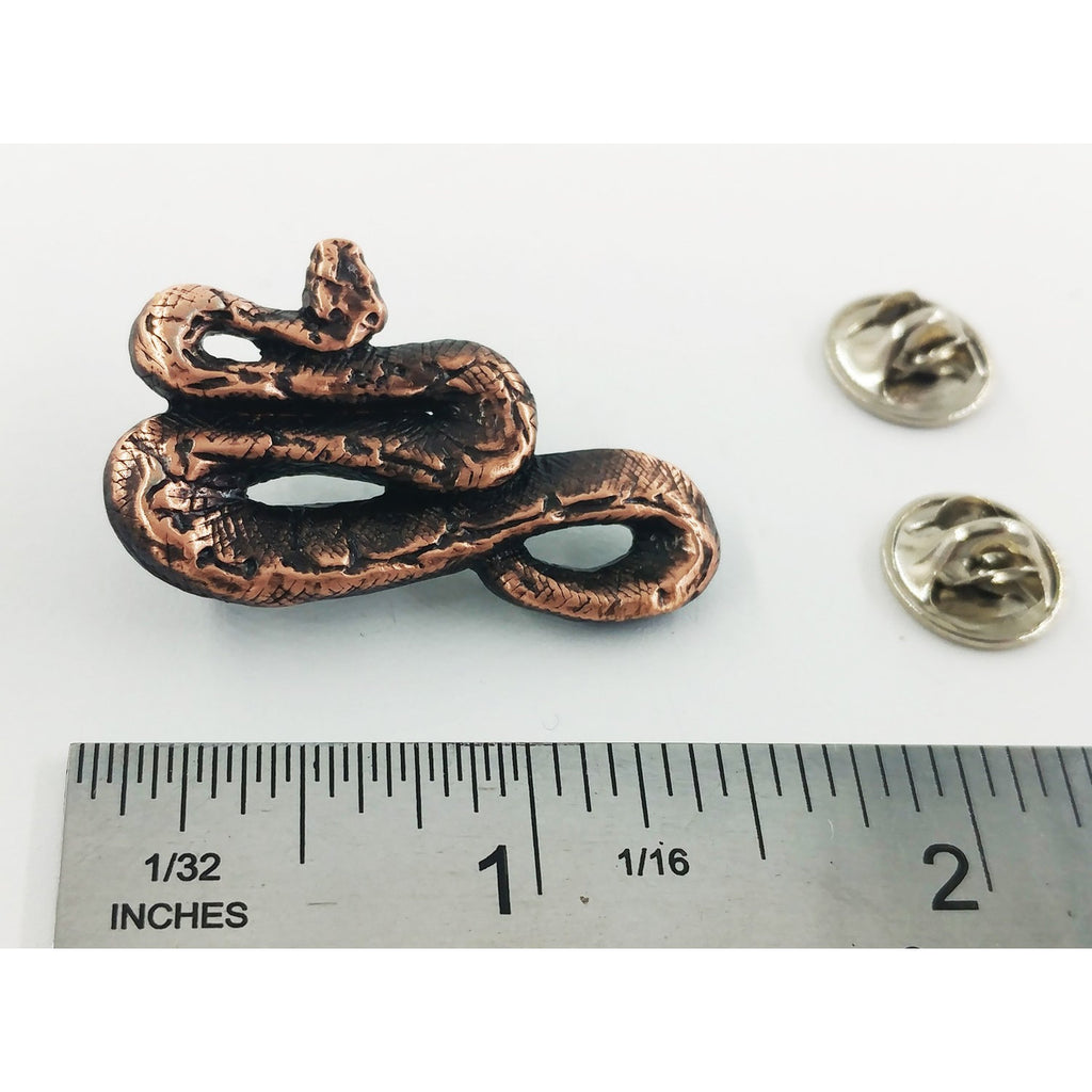 A handcrafted Boa Constrictor Pin next to a ruler, available for sale at Creativeartisan.com - the image offers a sense of scale